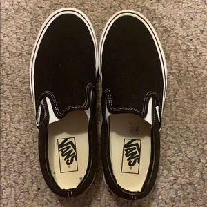 black and white slip on vans